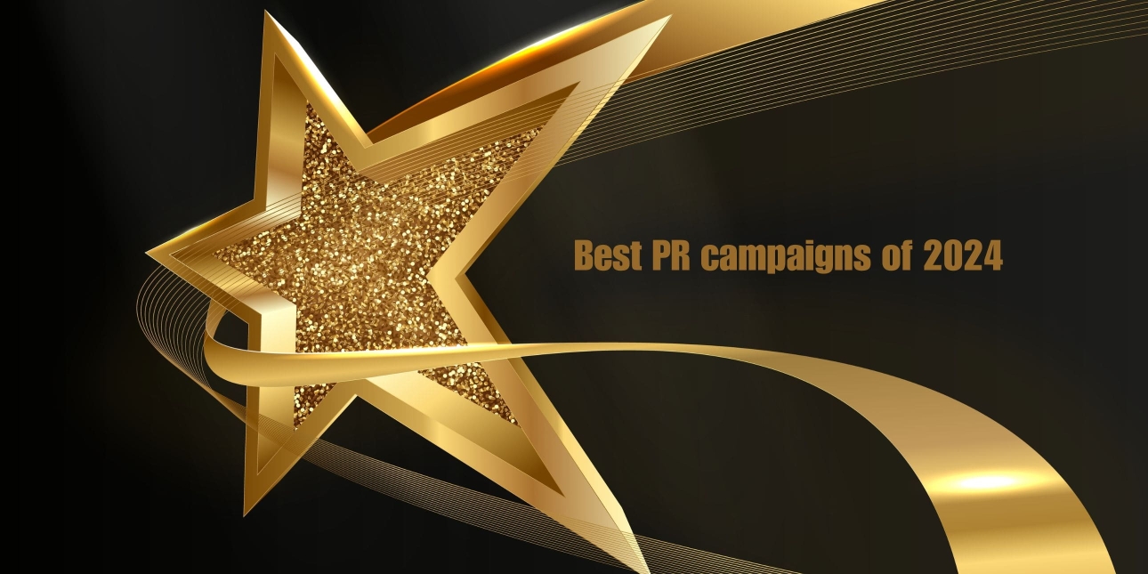 A computer generated image a three dimensional gold star on a black background. Viewed on an angle it has a thick gold outline. There inside of the star contains gold specs